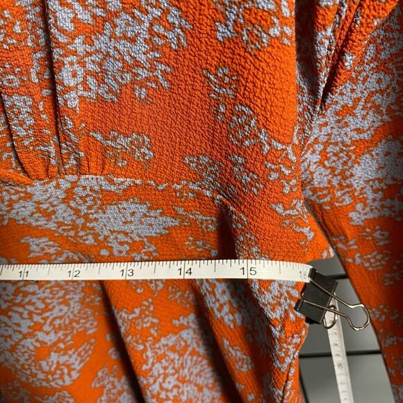 Unbranded women’s floral long sleeve rust colored romper NWOT - Picture 9 of 10